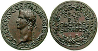 Sesterius of Caligula with four line legend within and oak wreath